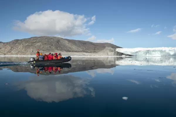 Zodiac tour to see glacier and the arctic landscape.
