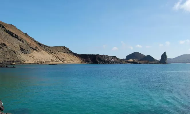The crystal blue waters surround Pinnicle Rock.