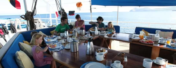 Dining on the deck of the Mary Anne.
