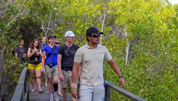 Taking a guided tour through the Galapagos.