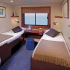 Captain Stateroom aboard the Safari Voyager.