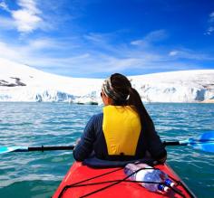 Kayak quiet waters as you sail to remote coves of Antarctica