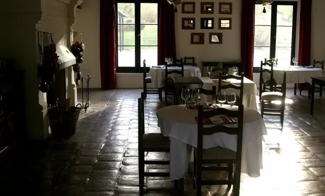 Enjoy a meal in the dining room.