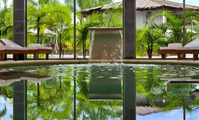 Relax by the luxurious outdoor pool.