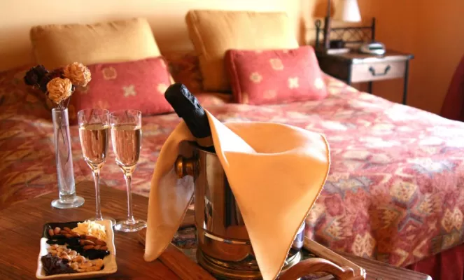 enjoy a snack and champagne in your room.