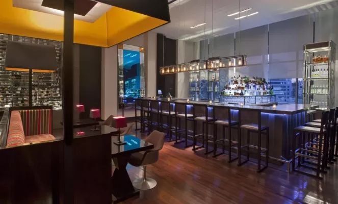 Enjoy a tasty and unique cocktail from the modernly designed bar at the W Lounge.