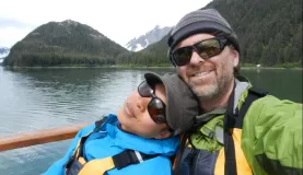 A couple enjoys their awesome adventure in Alaska
