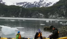 Kayaking around the hunks of glacial ice can be quite a challenge