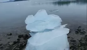 A large hunk of ice on the coast that hasn't yet melted