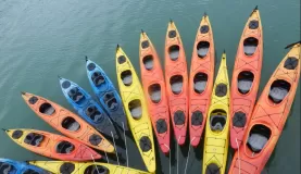 The kayaks hanging off the back of the ship