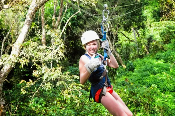 Posing for the camera while ziplining.