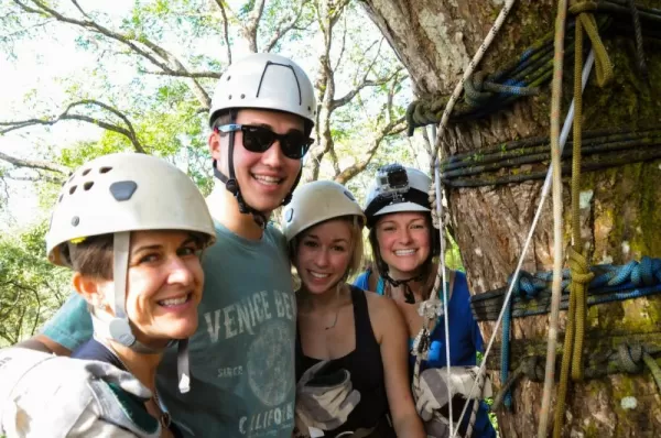 A family getting ready to do some ziplining.