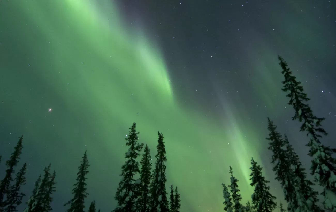 Witness the stunning Aurora Borealis.