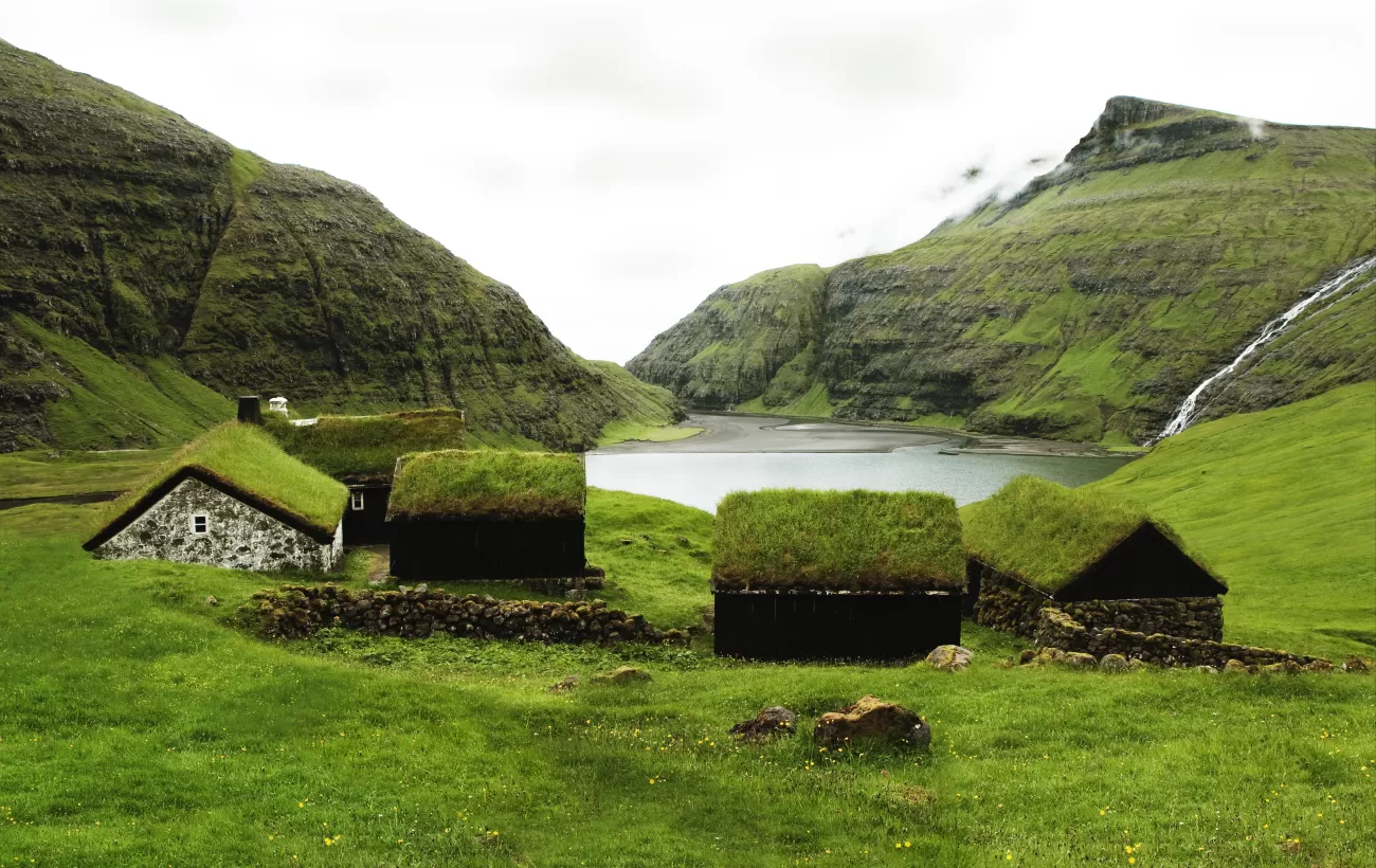 Grass covers the houses of the Faroe Islands, blending them into the landscape.