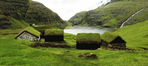 Grass covers the houses of the Faroe Islands, blending them into the landscape.