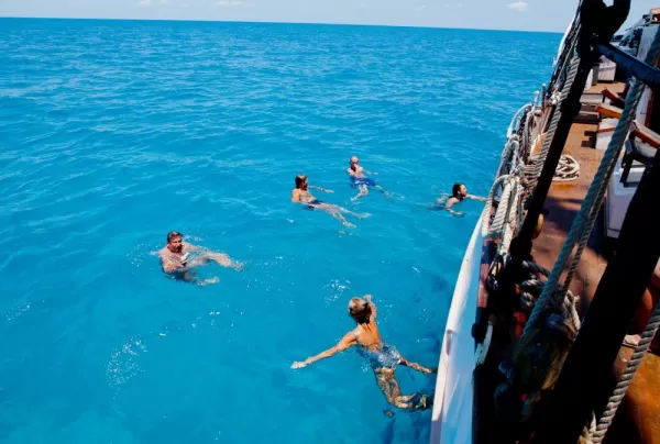 Swimming off the side of the Liberty Clipper in the crystal clear waters.