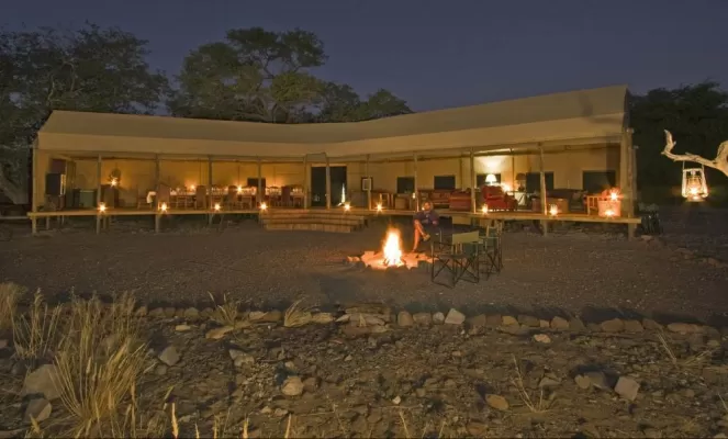 A view of the Desert Rhino Camp at night.