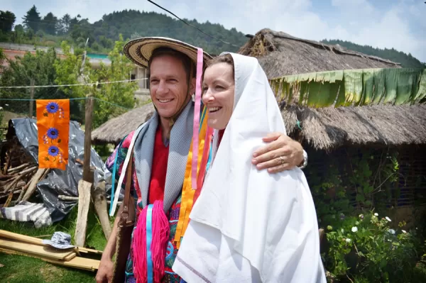 A couple in traditional marriage attire for the region.