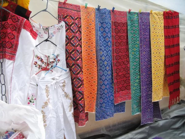 Enjoy markets filled with beautiful textiles.