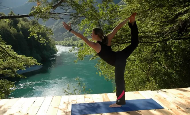 Enjoy some refreshing yoga by the river.