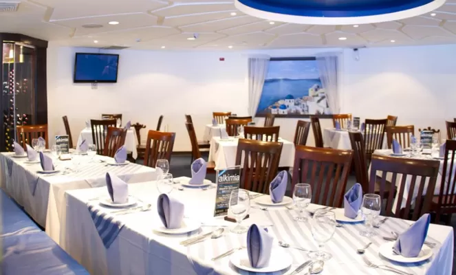 The restaurant's design is influenced by the architecture of Santorini