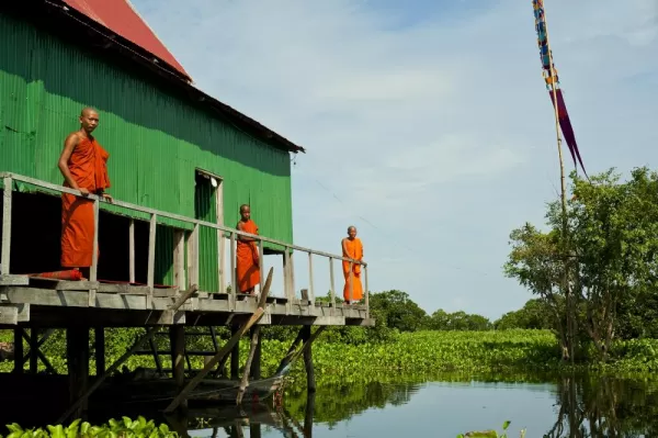 Monks above the water in Tonle Sap