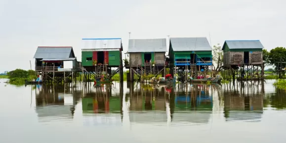 Explore the floating village of Tonle Sap