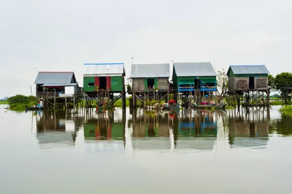 Explore the floating village of Tonle Sap