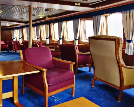 Enjoy the large windows as you sail on the MS Lofoten