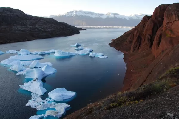 Icebergs float throughout the seas in the Arctic