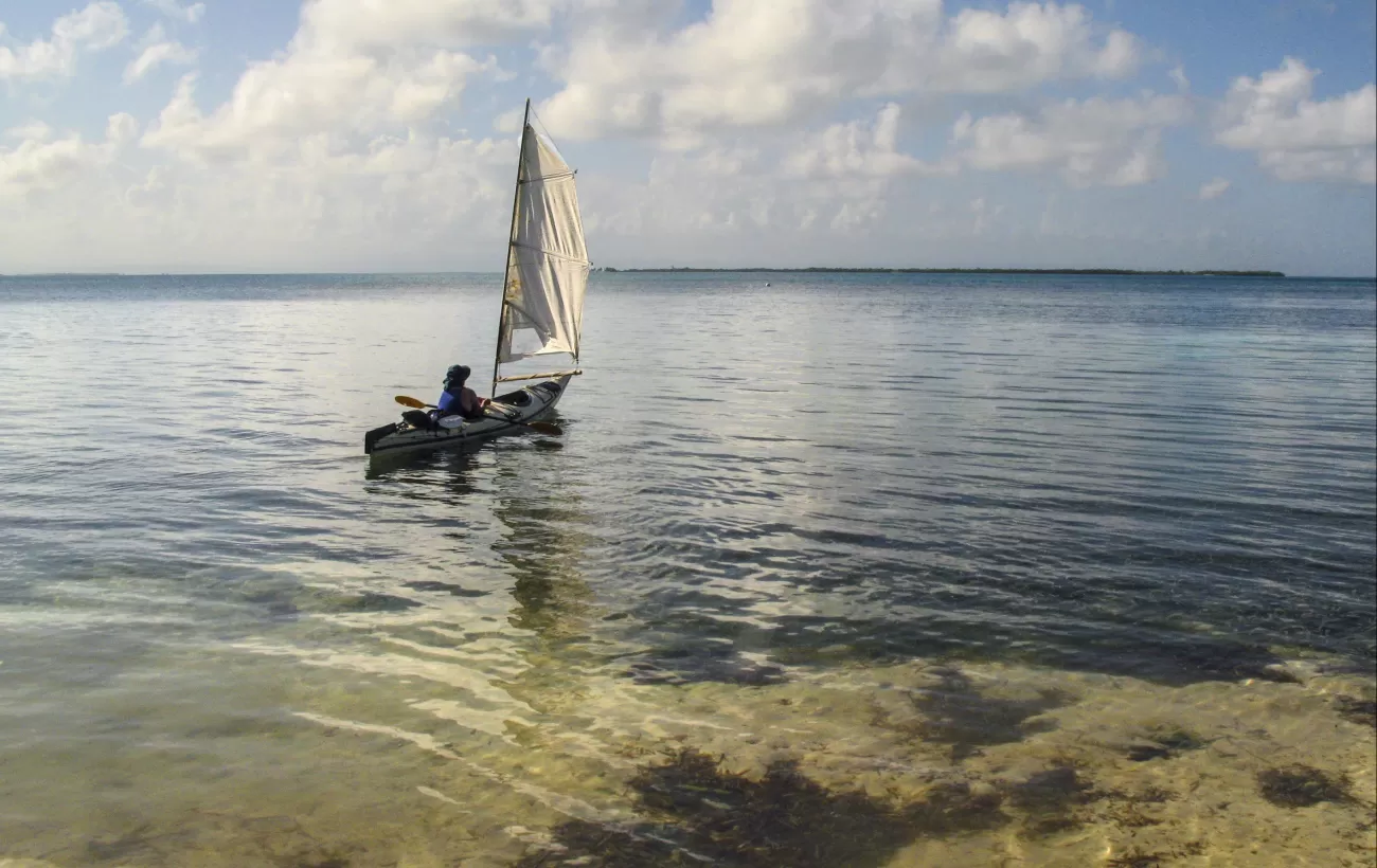 Attach a sail to your kayak for peaceful drifting