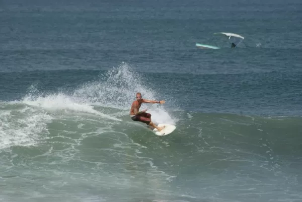 An experienced surfer off the coast of Soma