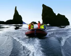 Zodiac boats bring you closer to the majestic Arctic landscape