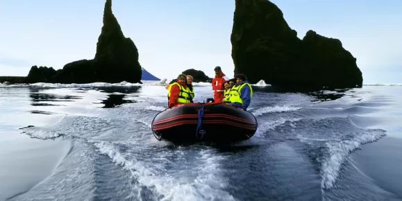 Zodiac boats bring you closer to the majestic Arctic landscape