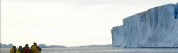 Enormous tabular icebergs dominate the Arctic landscape