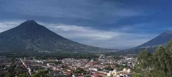 The city of Antigua is nestled between two volcanos