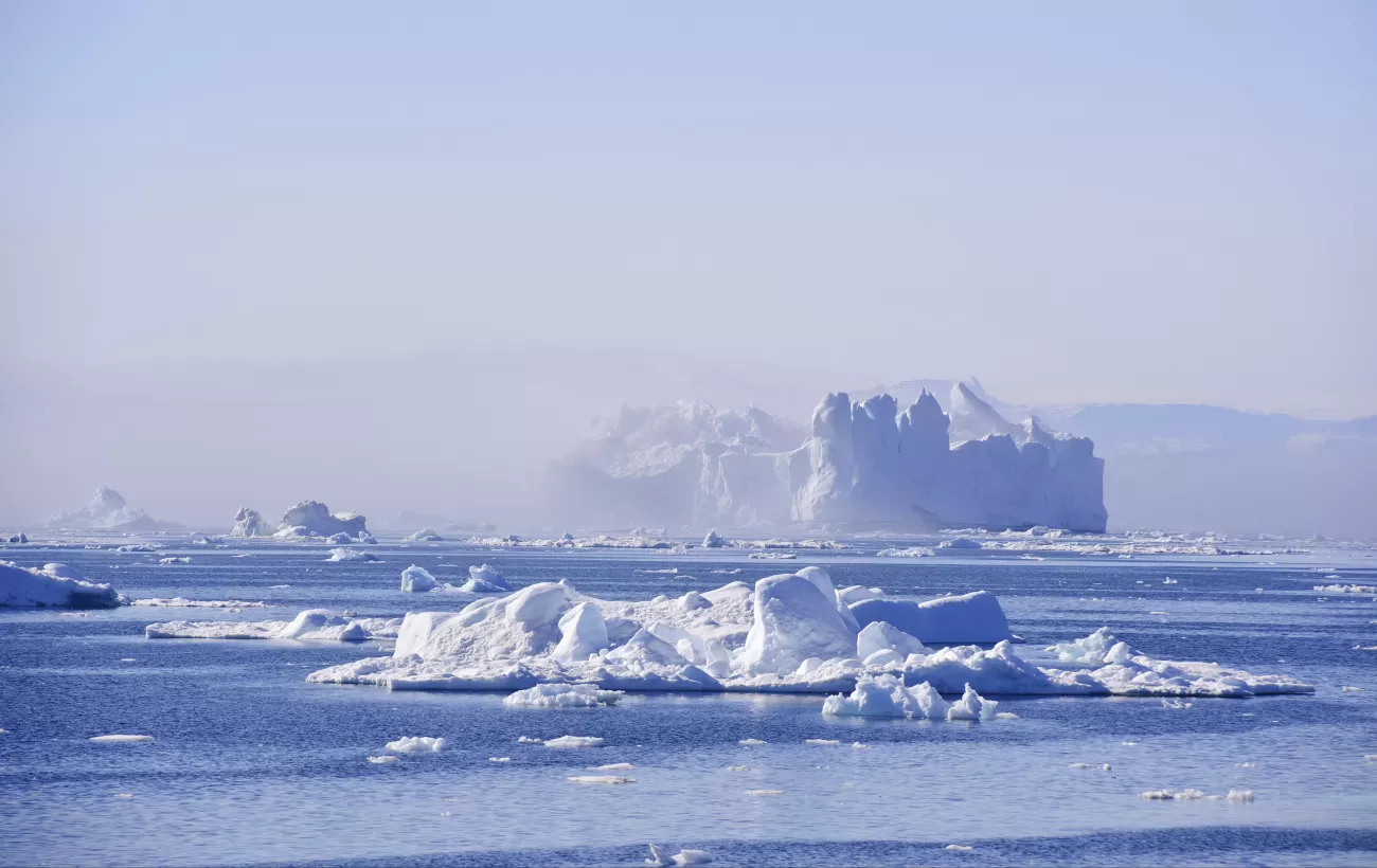 A towering iceberg drifts in Disko Bay