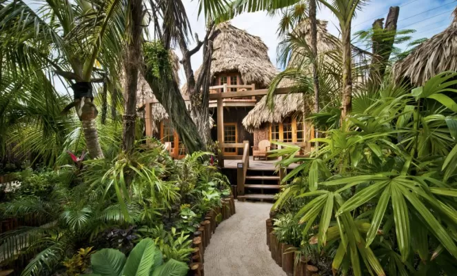 Walk the pathways at Ramon's Village's to your cabana