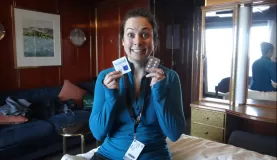The Drake Passage: Taking seasick prevention pills and putting on a patch.