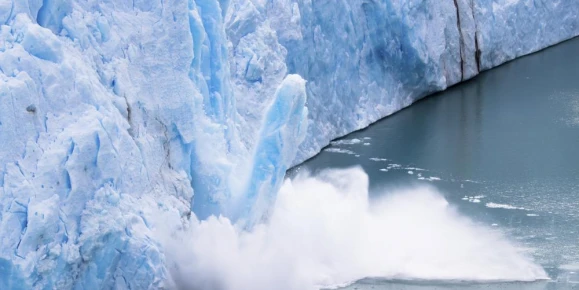 Ice falling from a glacier