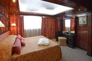 Your stateroom on the Caledonian Sky is large and allows great light
