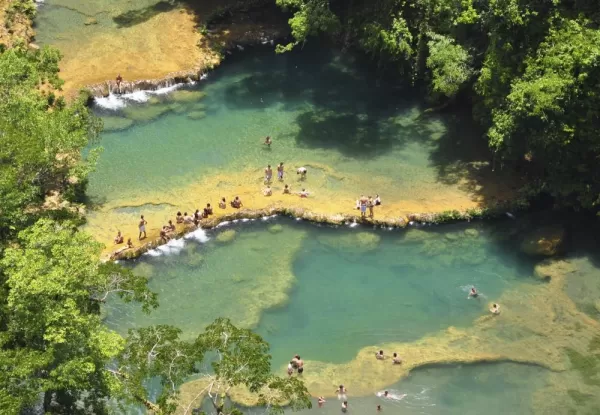 Swim in the crystal pools of Semuc Champey on your Guatemala Tour