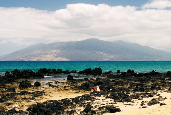 Boy playing on a Hawaii beach
