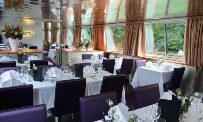 Admire the scenery as you dine on the MS Raymonde
