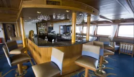 The bar and lounge aboard the Galapagos Legend