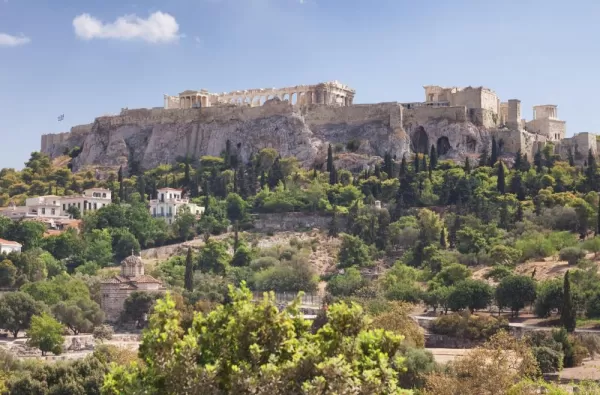 The towering ruins of the Acropolis rise over Athens