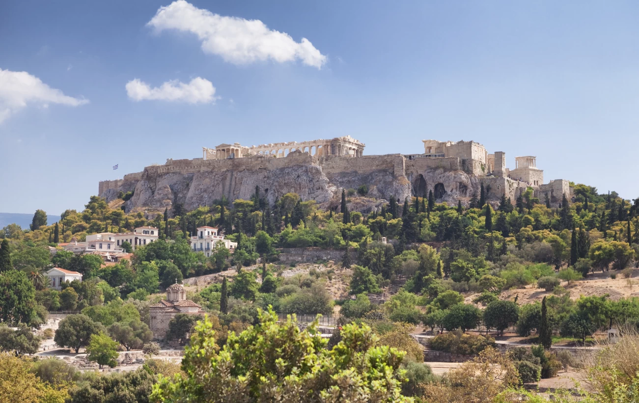 The towering ruins of the Acropolis rise over Athens