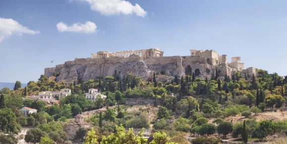 The towering ruins of the Acropolis rise over Athens