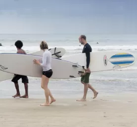 Surfers at Tamarindo Beach