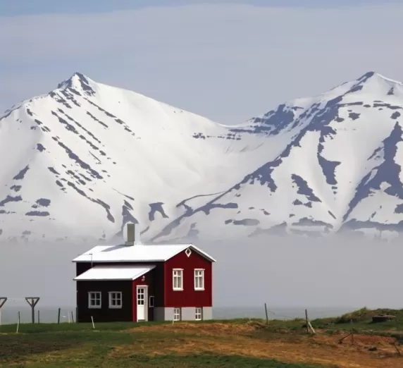 Red house on a fjord in Iceland